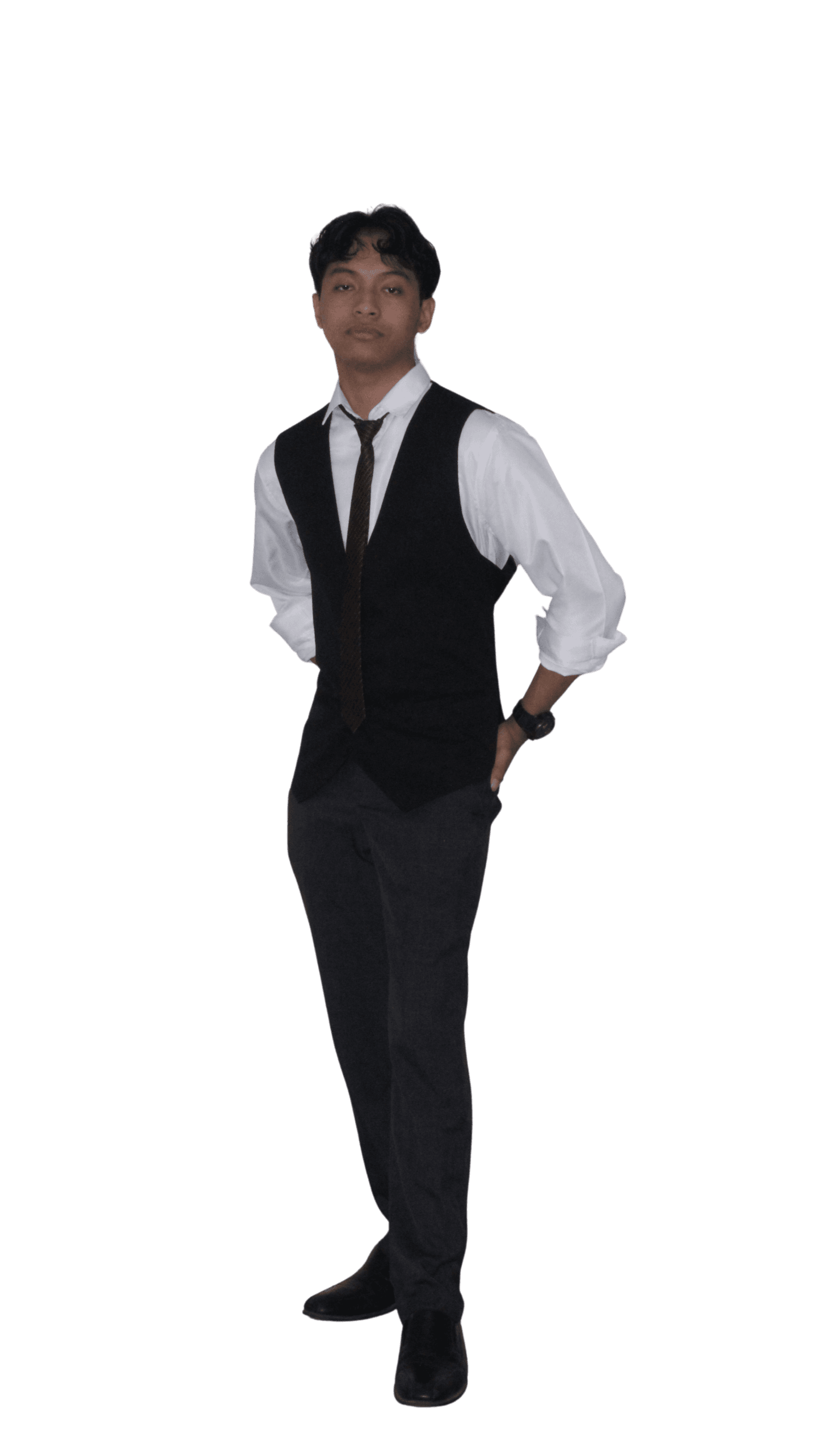 Darryll Eral standing in a formal vest and tie